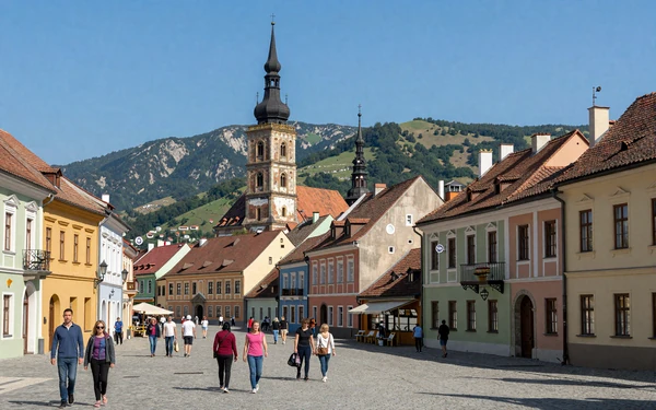 Brașov medieval old town with Carpathian Mountains backdrop and colorful historic buildings